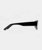 Amara chunky geometric sunglasses in black with gray lenses, side view