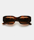 Amara chunky geometric sunglasses in tortoise with orange lenses, front view