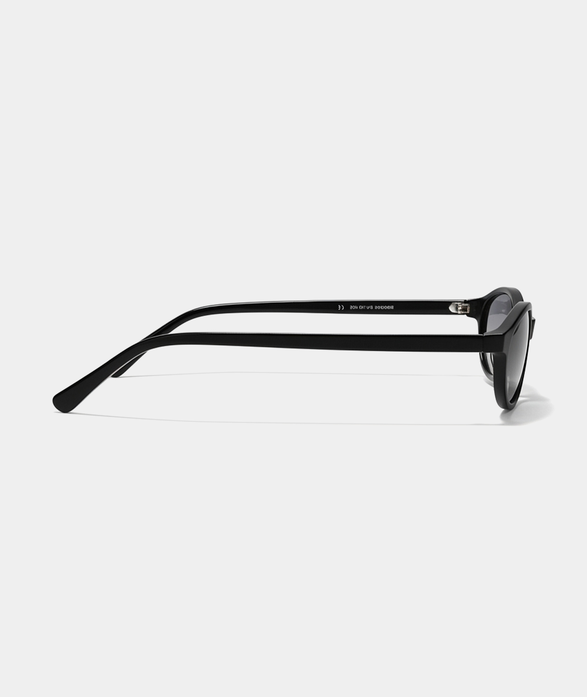 Cleo cat-eye sunglasses in black with gray lenses, side view