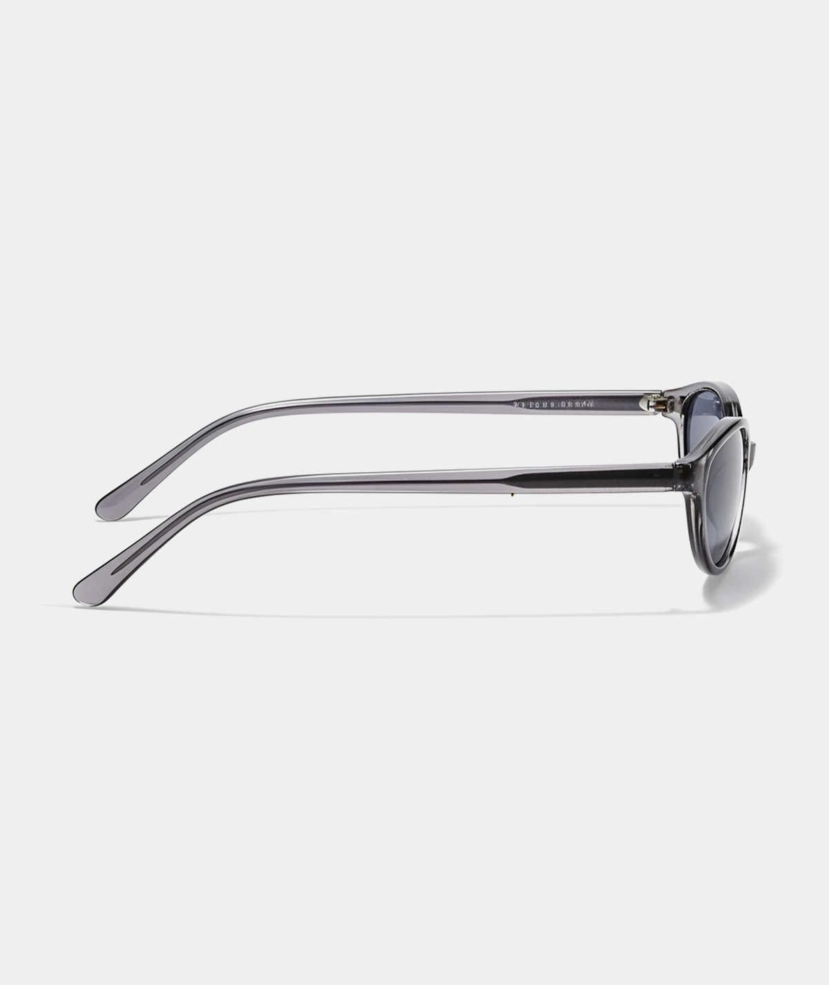 Cleo cat-eye sunglasses in transparent gray with gray lenses, side view