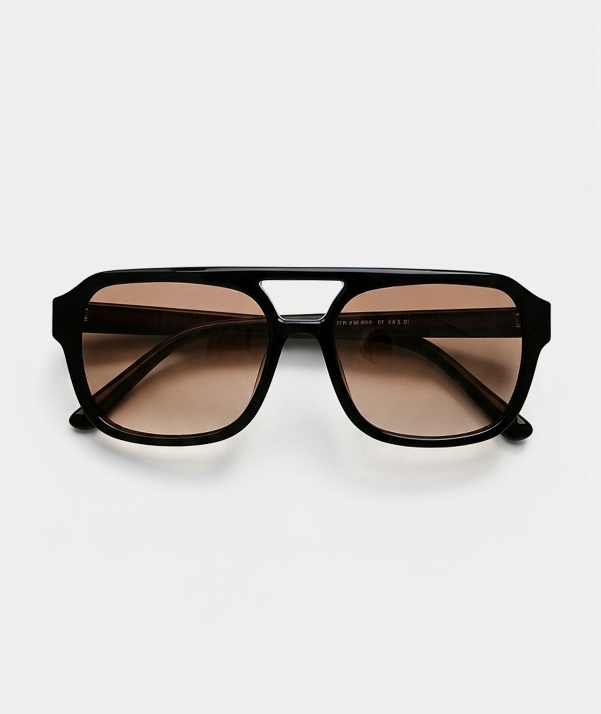 Mirage aviator sunglasses in black with amber lenses, front view