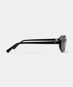 Solene oval sunglasses in black with gray lenses, side view