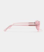 Solene oval sunglasses in transparent pink with pink lenses, side view