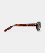 Solene oval sunglasses in tortoise with green lenses, side view