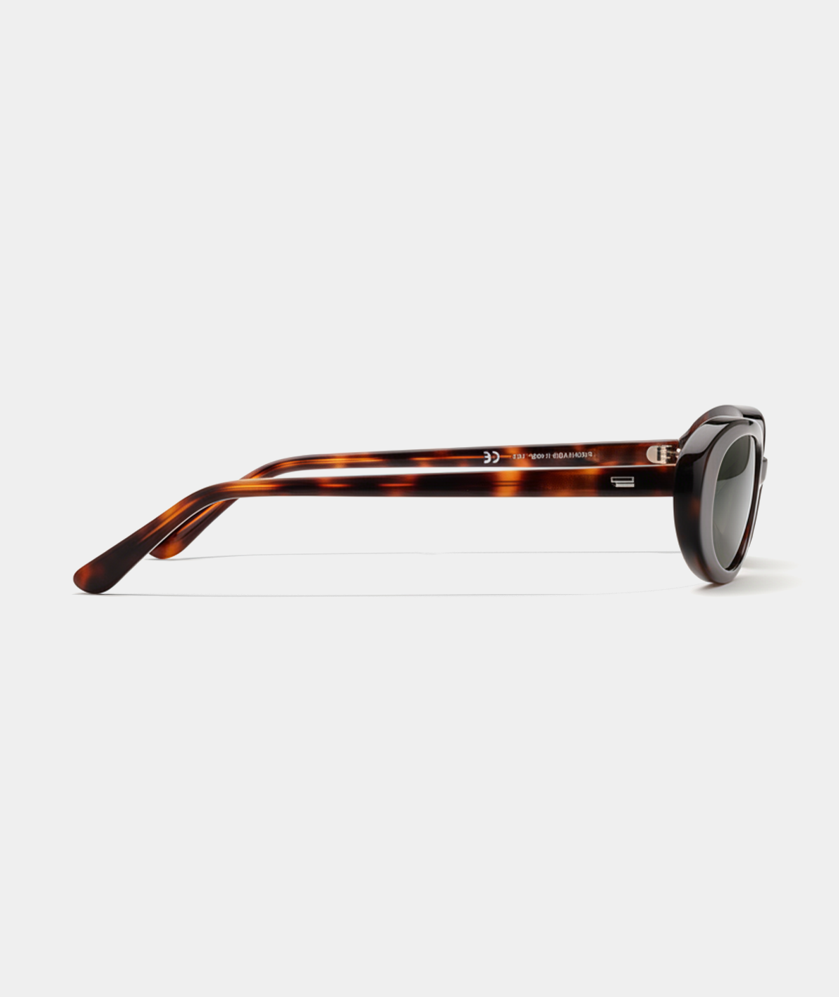 Solene oval sunglasses in tortoise with green lenses, side view